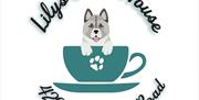 Logo for "Lilys Bake House" featuring an illustrated dog with its front paws resting on the edge of a teal teacup, which sits on a matching saucer wit
