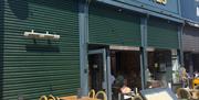 Outdoor seating area and entrance of Butler Whites restaurant on Humber Street, Hull.